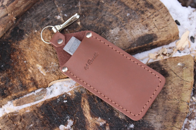Finnish sharpening stone in leather case photo